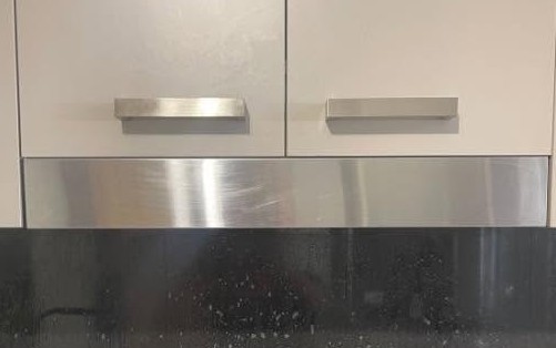 The same cupboards and rangehood after cleaning